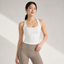 Velvet model | Racerback Fixed-Cup Yoga Bra | White | racerback-fixed-cup-yoga-bra-white-front-v4-1x1.png