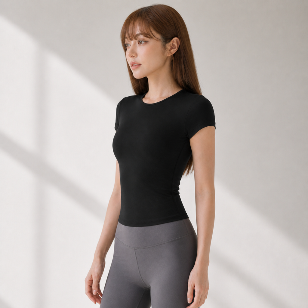 Velvet model | Contour Short-Sleeve Yoga Tee | Black | contour-short-sleeve-yoga-tee-black-side-v4-1x1.png