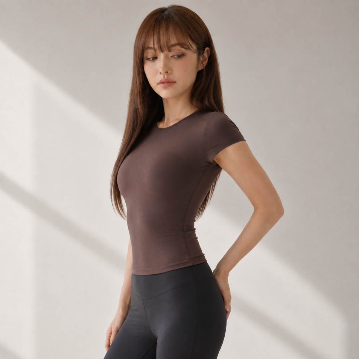 Velvet model | Contour Short-Sleeve Yoga Tee | Brown | contour-short-sleeve-yoga-tee-brown-side-v4-1x1.png