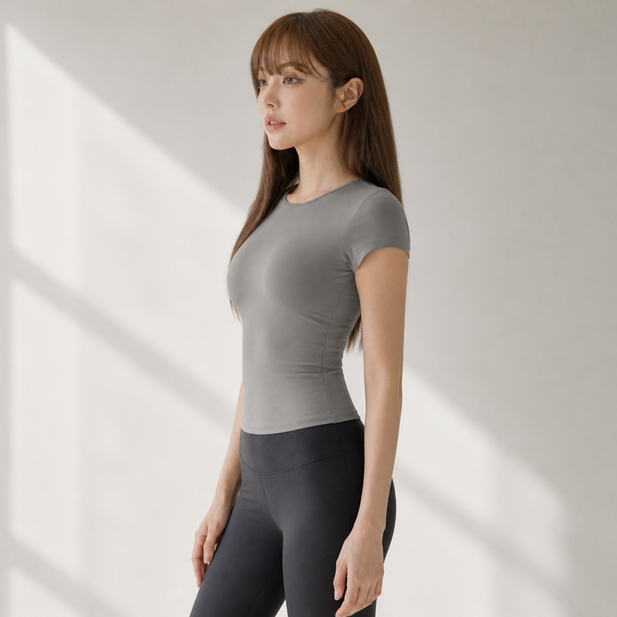 Velvet model | Contour Short-Sleeve Yoga Tee | Grey | contour-short-sleeve-yoga-tee-grey-side-v4-1x1.png