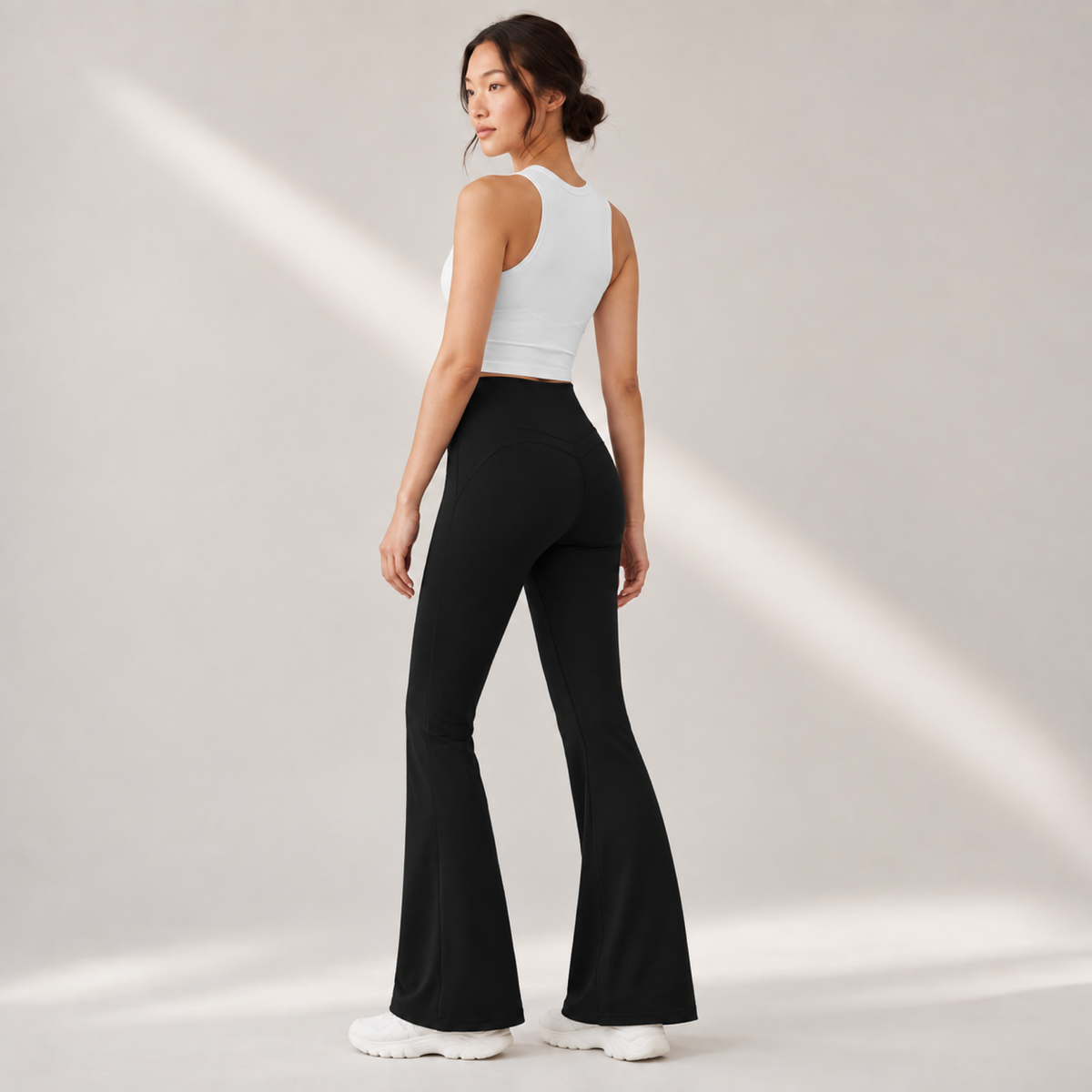 Velvet model | High-Rise Flared Yoga Pants | Black | high-rise-flared-yoga-pants-black-side-v5-1x1.png