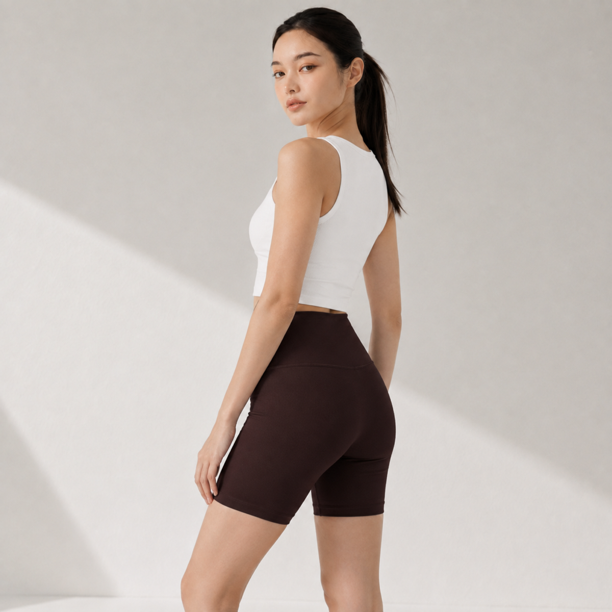 Velvet model | Naked-Feel 5-Inch Yoga Shorts | Brown | naked-feel-5-inch-yoga-shorts-brown-side-v5-1x1.png
