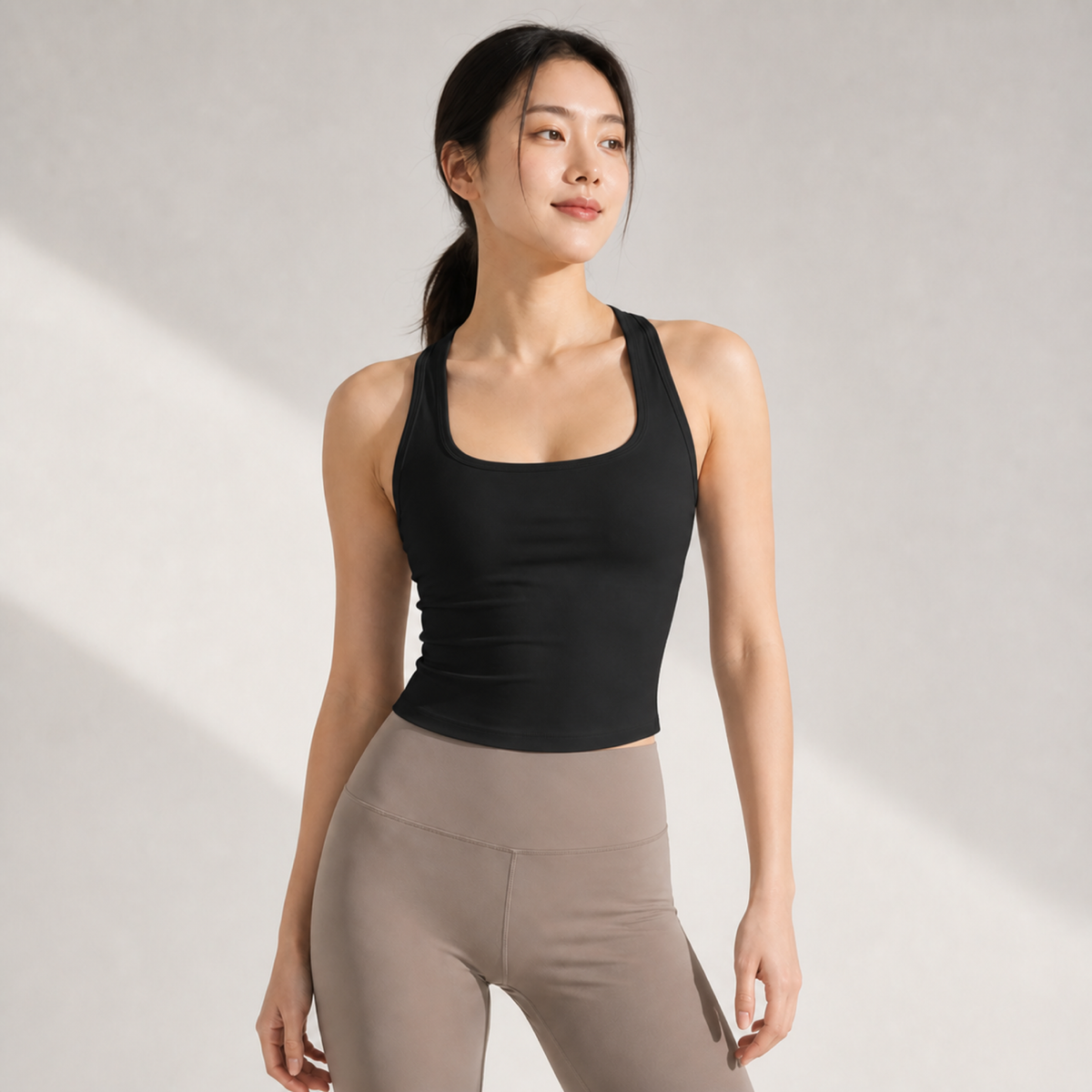 Velvet model | Racerback Fixed-Cup Yoga Bra | Black | racerback-fixed-cup-yoga-bra-black-front-v4-1x1.png 主圖
