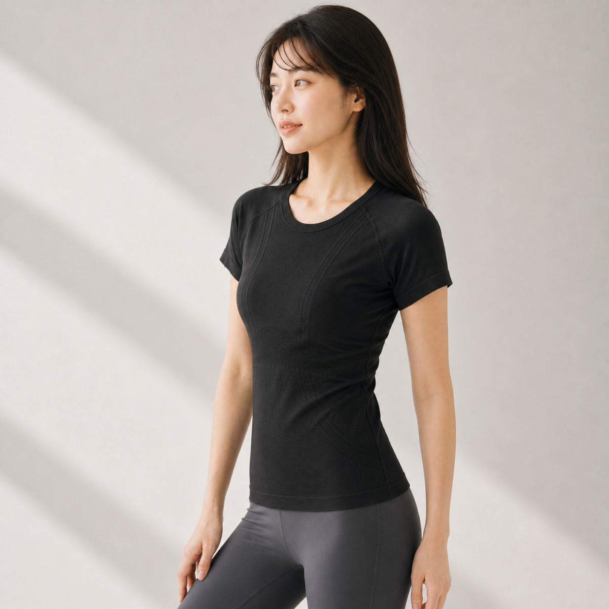 Velvet model | Seamless Sculpt Yoga Tee | Black | seamless-sculpt-yoga-tee-black-side-v4-1x1.png