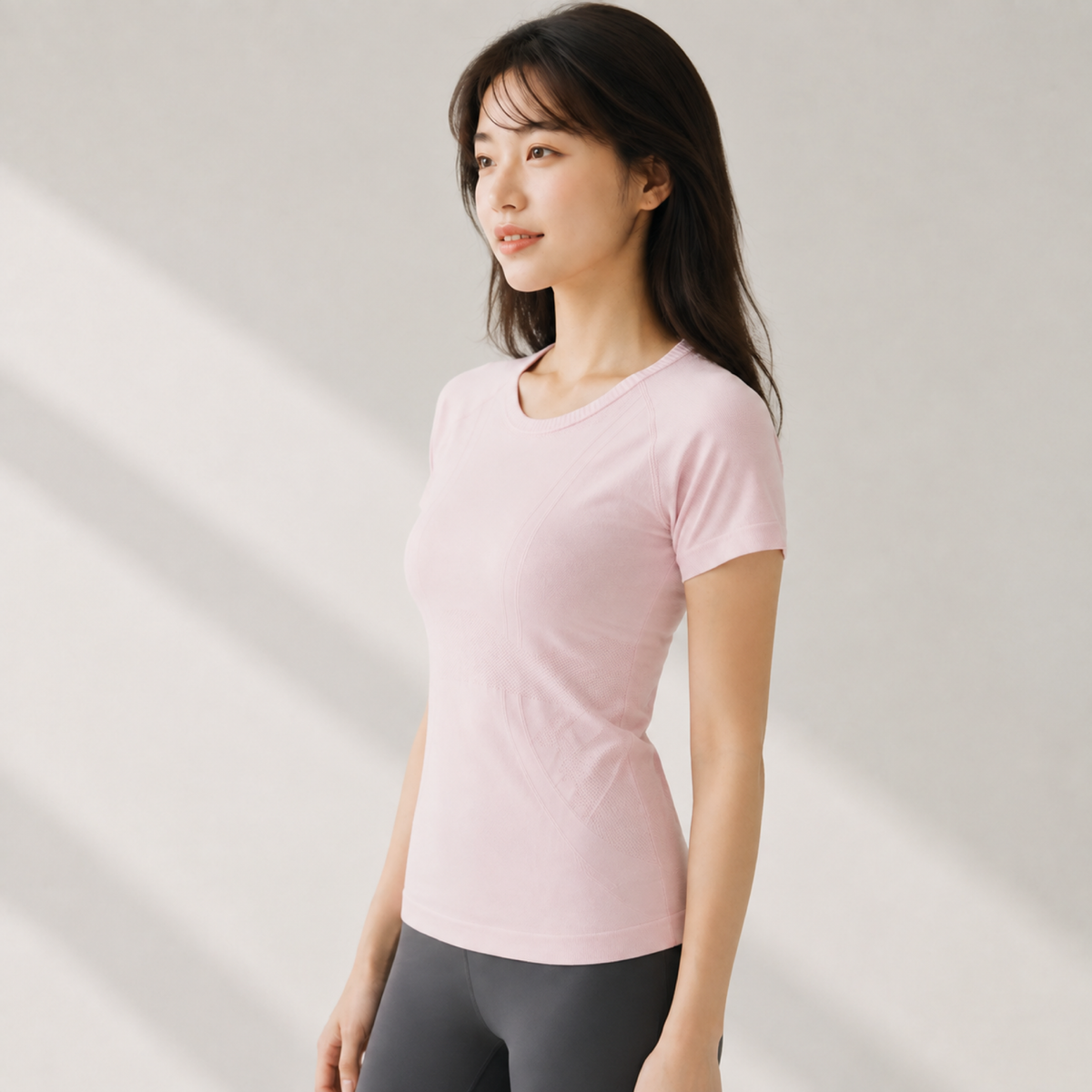 Velvet model | Seamless Sculpt Yoga Tee | Pink | seamless-sculpt-yoga-tee-pink-side-v4-1x1.png