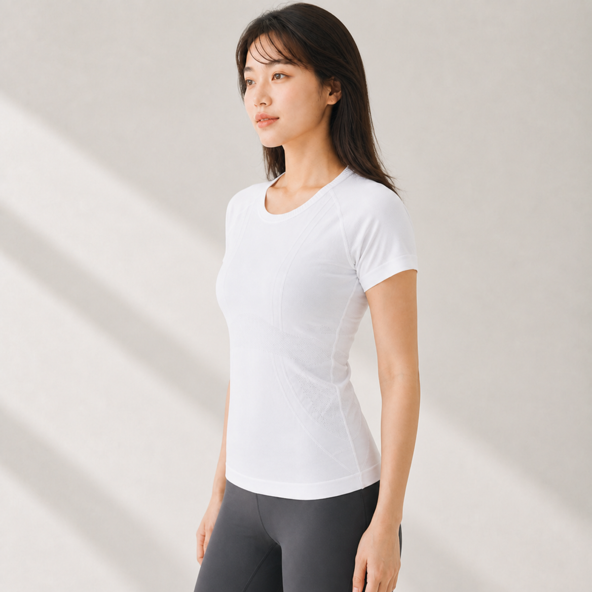 Velvet model | Seamless Sculpt Yoga Tee | White | seamless-sculpt-yoga-tee-white-side-v4-1x1.png