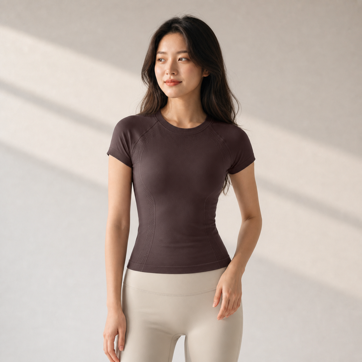 Velvet model | Seamless Short-Sleeve Yoga Tee | Brown | seamless-short-sleeve-yoga-tee-brown-front-v4-1x1.png